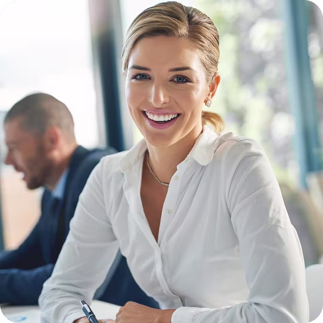 a woman smiling at camera